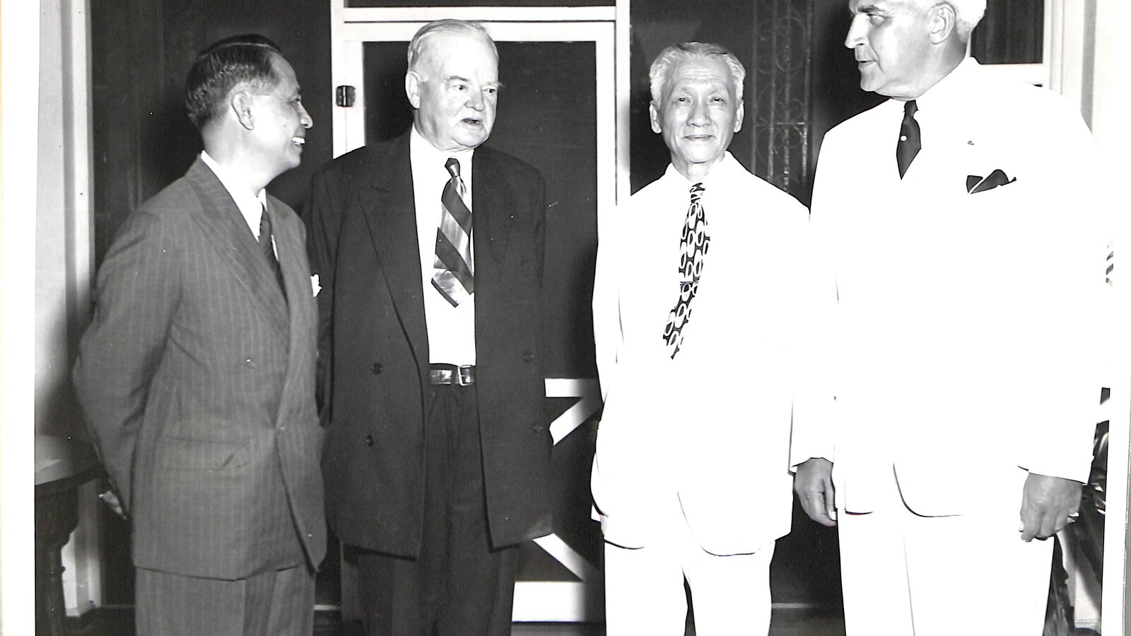 Manuel Roxas, Herbert Hoover, Sergio Osmeña, and Paul McNutt meeting in Manila in 1946.