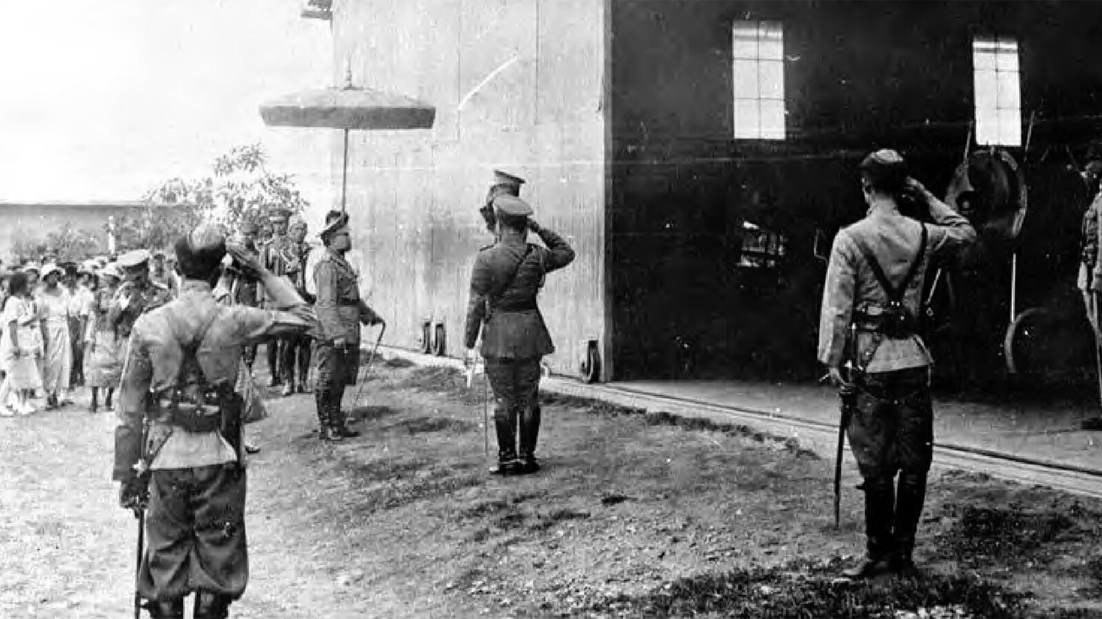 King Vajiravudh of Siam inspecting an aircraft hangar in 1914