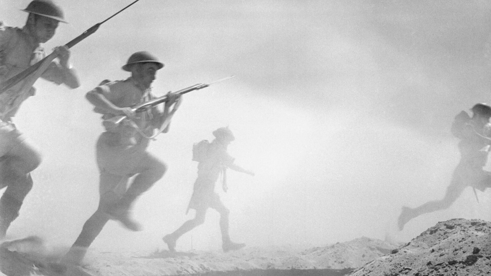 British infantry advancing through dust and smoke during the Second Battle of El Alamein, October 24, 1942