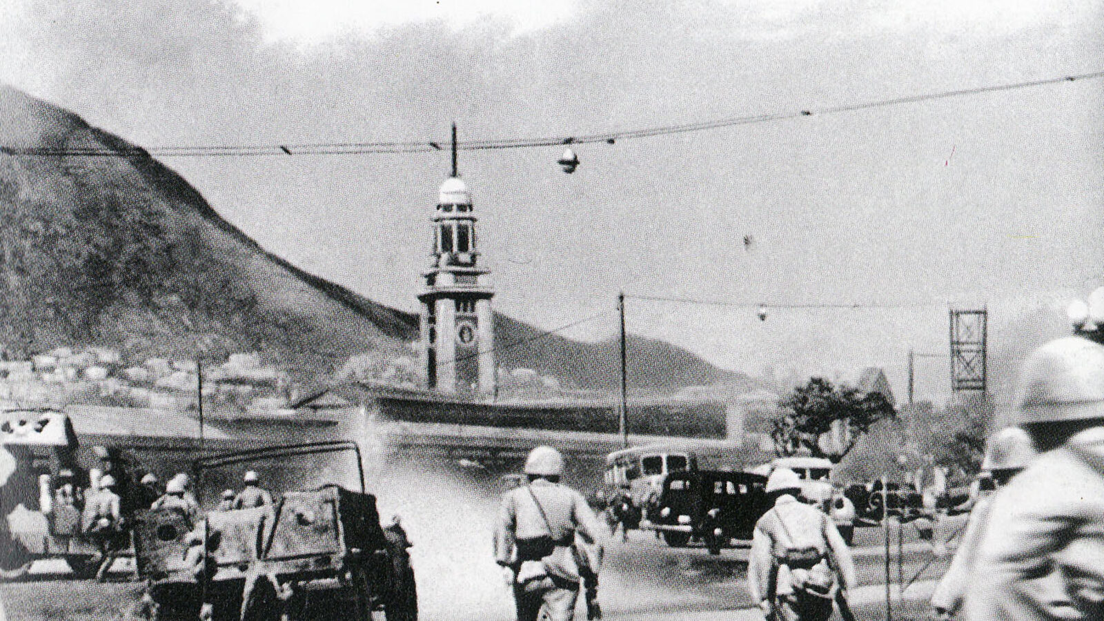 Imperial Japanese Army troops assaulting Tsim Sha Tsui Station during the Battle of Hong Kong, December 1941