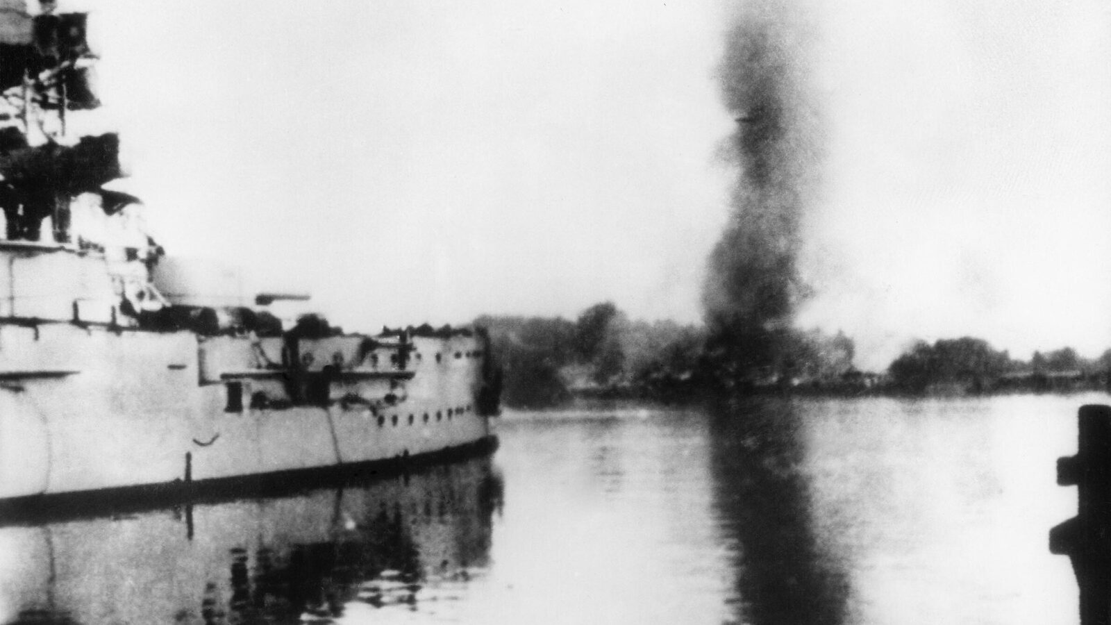 German battleship SMS Schleswig-Holstein firing at the Polish garrison at Westerplatte during the opening days of the Invasion of Poland, September 5, 1939