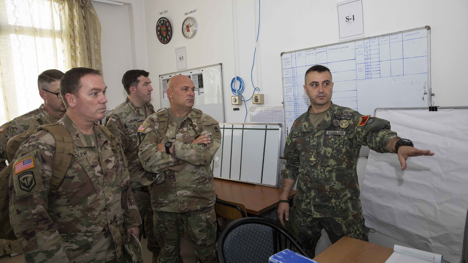 Albanian Armed Forces officer briefs New Jersey National Guard leaders at Land Forces Headquarters, Tirana, September 2022