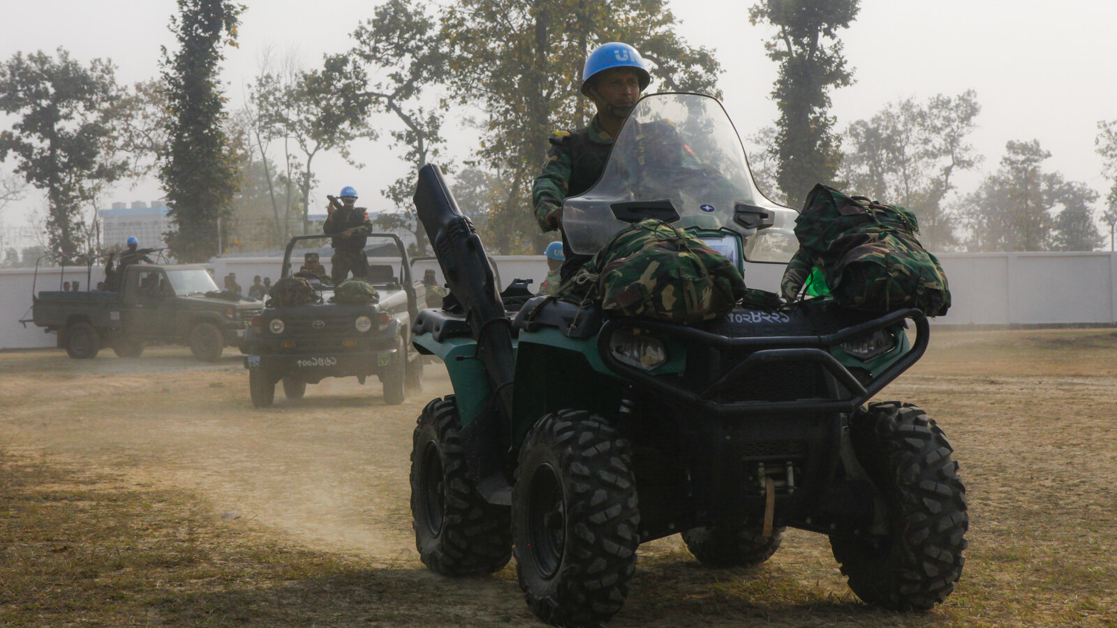 Bangladesh Army soldiers in vehicles return to encampment after a demonstration during Exercise Shanti Doot 4, February 2018