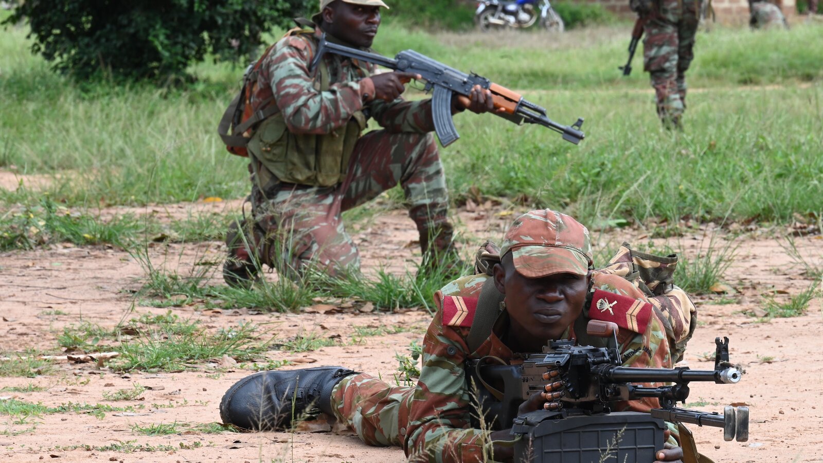 Beninese 1st Commando Parachute Battalion soldiers provide security during U.S. Special Forces Joint Combined Exchange Training at Ouassa, Benin, September 2022