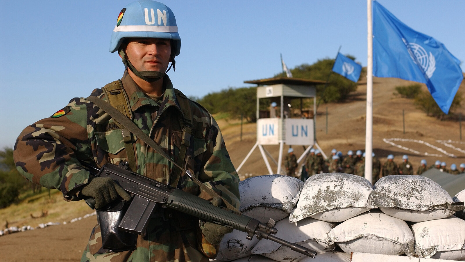 Bolivian Army 2nd Lt. Mauricio Vidangos stands guard at an observation point during multinational peacekeeping training in Chile, October 2002