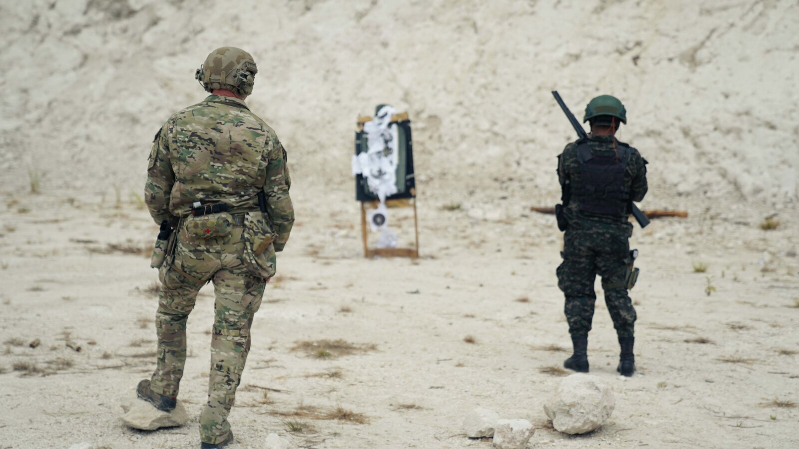 U.S. 7th Special Forces Group conducts firearms training with a Honduran military servicemember during CENTAM Guardian 24 in La Venta, Honduras, April 2024