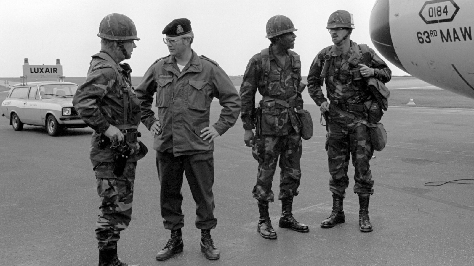 Major General Edward Partain converses with a Luxembourg Army officer at Luxembourg Airport during Exercise Reforger '82, September 1982