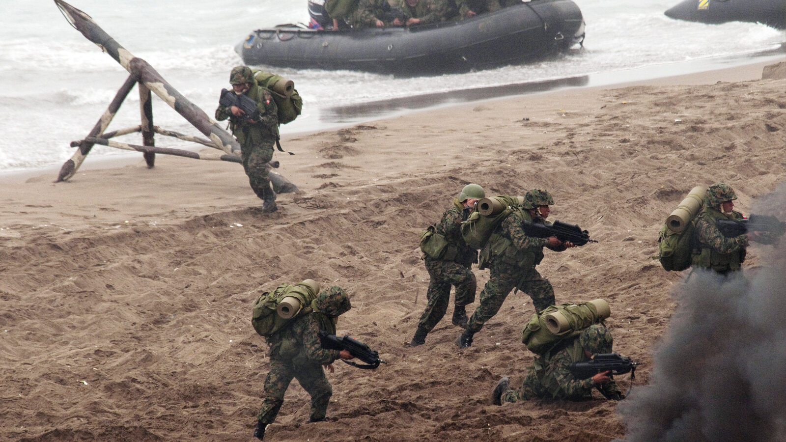 Peruvian marines storm Ancon Beach, Peru during a multinational beach assault exercise as part of Amphibious-Southern Partnership Station 2010, July 2010