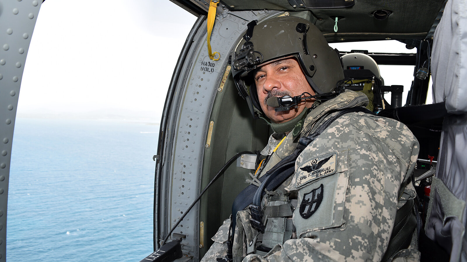 Puerto Rico Army National Guard soldier in a UH-60 Black Hawk helicopter near Vieques, Puerto Rico, June 2014
