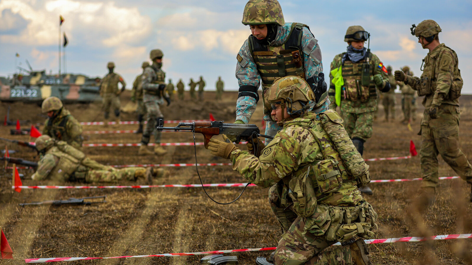 US Army Soldiers and Romanian forces conduct a Combined Arms Live Fire Exercise at the Smardan training area, Romania, March 2022